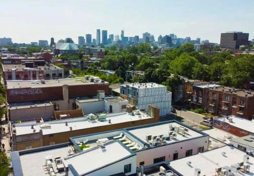an aerial view of a city with buildings at LiV MTL Main in Montréal