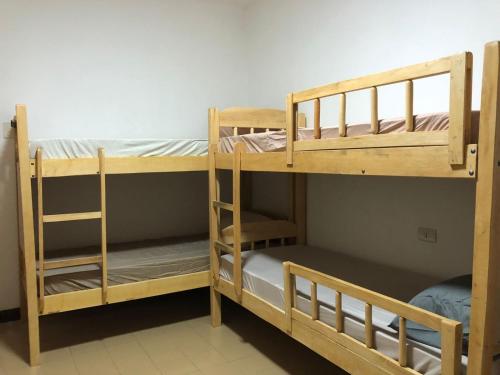 Letto o letti in una camera di Frida Hostel