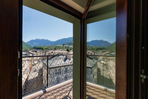 a view of a city from a window at Hotel Stelvio Tirano in Tirano