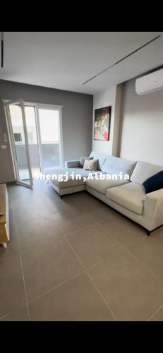 Ένα ή περισσότερα κρεβάτια σε δωμάτιο στο Apartamente luxury Shengjin