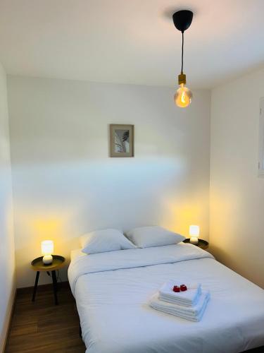 Postel nebo postele na pokoji v ubytování Comme A La Maison