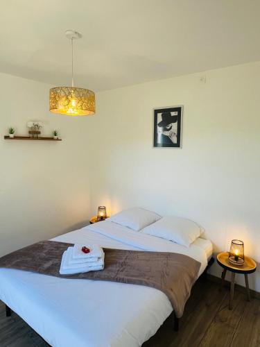 Postel nebo postele na pokoji v ubytování Comme A La Maison