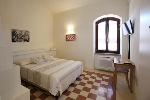 Кровать или кровати в номере Le Terrazze della Planargia B&B