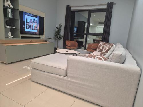 TV a/nebo společenská místnost v ubytování Zhou Hotels Itowers