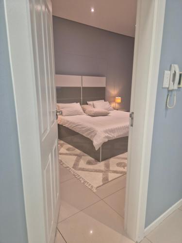 Postel nebo postele na pokoji v ubytování Zhou Hotels Itowers