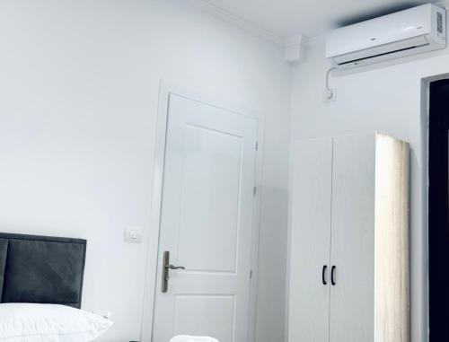 Ledio GuestHouseにあるベッド