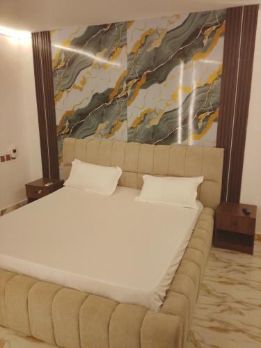 Voodi või voodid majutusasutuse Imaginus resort toas