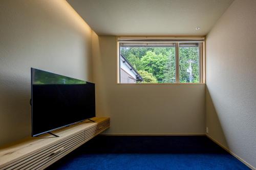 左京山SAkyozanにあるテレビまたはエンターテインメントセンター