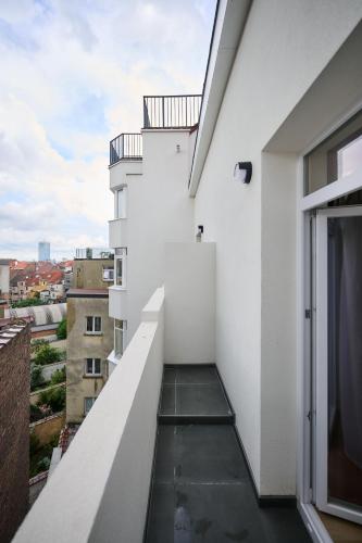a view from the balcony of a white building at Apartment La Barrière 6 in Brussels