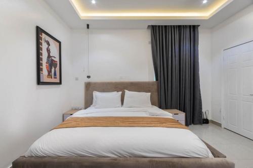 Katil atau katil-katil dalam bilik di MEX APARTMENTs Parkview ikoyi