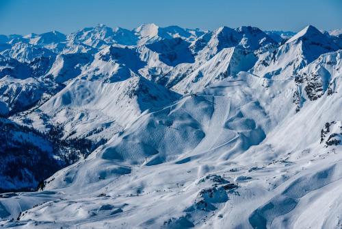 an aerial view of a snow covered mountain at Hotel Zehnerkar & Hotel Obertauern in Obertauern