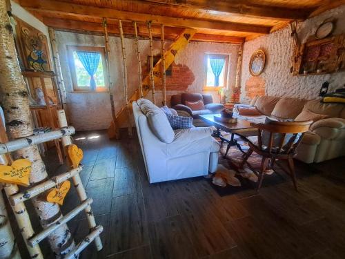 an overhead view of a living room with a table and chairs at Kuca za odmor in Vitez