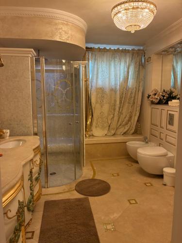 Ένα μπάνιο στο Villa Gloria Nouvel Hôte