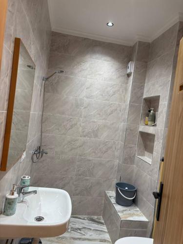 a bathroom with a sink and a toilet at apparemment sea view03 in Tangier