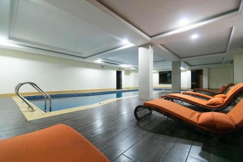 Πισίνα στο ή κοντά στο MEX APARTMENTs Parkview ikoyi