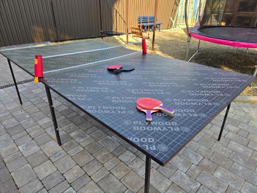 Stolní tenis v ubytování Glory nebo okolí