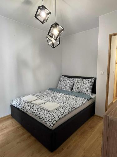 Postel nebo postele na pokoji v ubytování Relaks