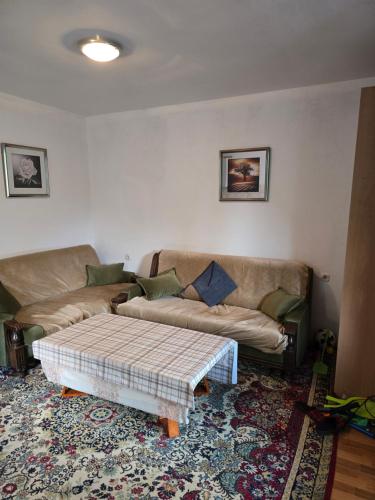 a living room with a couch and a coffee table at Bella 