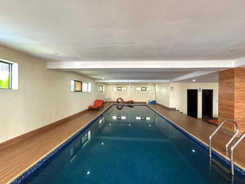 a swimming pool in a hotel room at Mex studio apartment banana island road ikoyi in Lagos