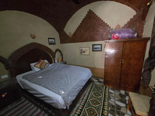 Postel nebo postele na pokoji v ubytování Villa Harmony Luxor