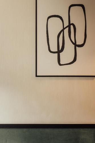 a picture on a wall with a picture on it at Getaway Studios Liège in Liège