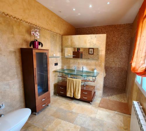 Η κουζίνα ή μικρή κουζίνα στο Chalet Rural Las Rozas