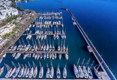 an aerial view of a marina with many boats at Pantheon Apartments Kos Town in Kos