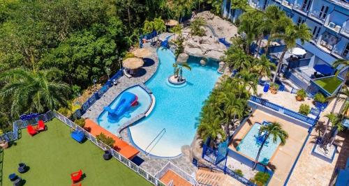 an overhead view of a pool at a water park at Hotel Vista Azul in Aguadilla