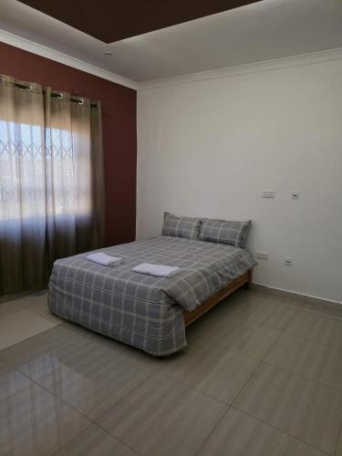 Ένα ή περισσότερα κρεβάτια σε δωμάτιο στο Chila Villa