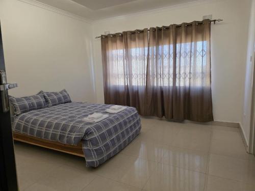 Ένα ή περισσότερα κρεβάτια σε δωμάτιο στο Chila Villa