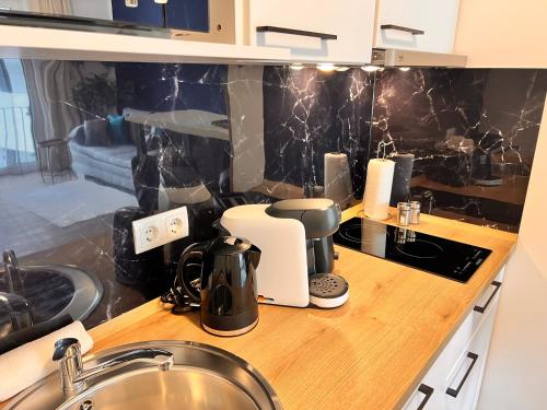 BS-Appartementにあるキッチンまたは簡易キッチン