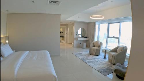 Ένα ή περισσότερα κρεβάτια σε δωμάτιο στο شقة في جوهرة داماك جدة