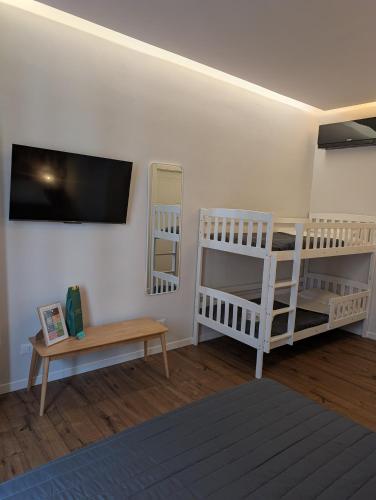 Postel nebo postele na pokoji v ubytování I Bimbi Guesthouse