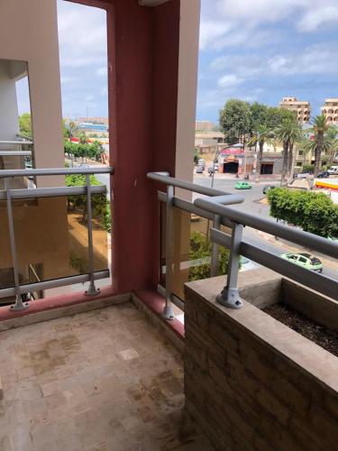 a balcony with a view of a street at Apartment Galia Mohammedia in Mohammedia