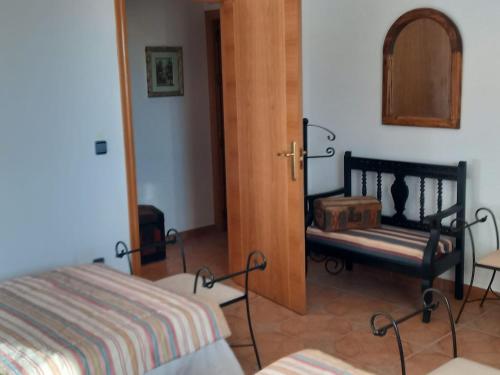 Postel nebo postele na pokoji v ubytování CASA RuRAL LOS DESAYUNOS
