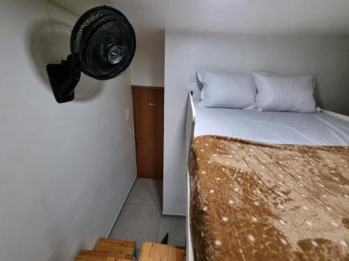 Galería fotográfica de Suíte privativa com cozinha e cama mezanino en São Paulo