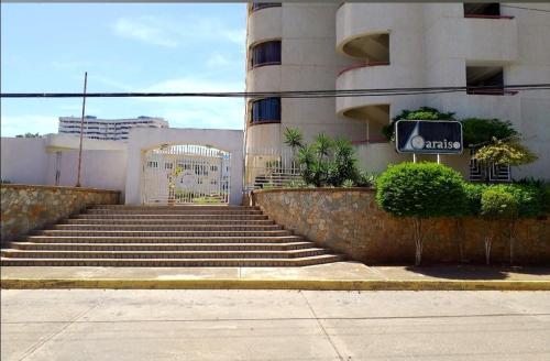 a set of stairs in front of a building at PARAJISO en Costa Azul in Porlamar