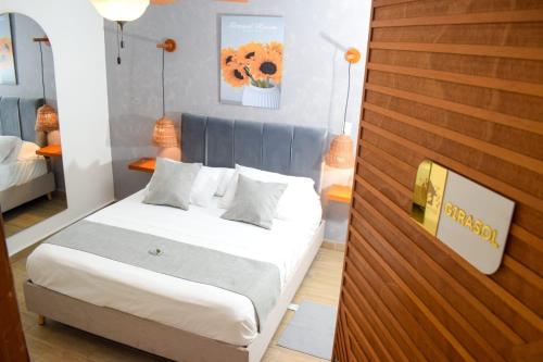 Ένα ή περισσότερα κρεβάτια σε δωμάτιο στο Muguet House Granada