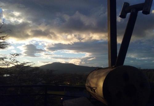 a room with a view of a mountain at Cabaña de las Flores in Tolhuin