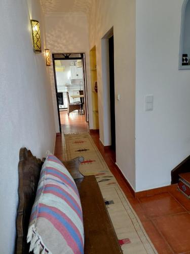 a living room with a couch sitting on the floor at Villa Sesta in Vila de Frades