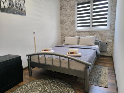 Postel nebo postele na pokoji v ubytování Vukašinova stanica