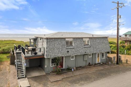 an image of a house with a balcony at Tide Pool Town Home, Entire House, Amazing Views! in Moclips