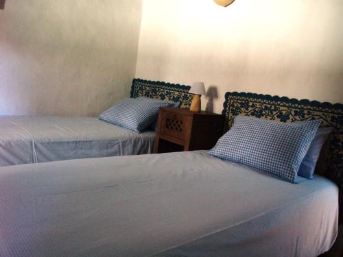 Postel nebo postele na pokoji v ubytování Casa da Ti Cura