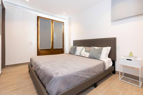 La Cuadra Apartments By Acomodoにあるベッド