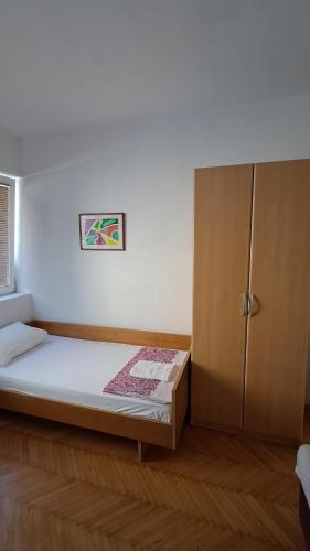 Llit o llits en una habitació de Apartment Kiki