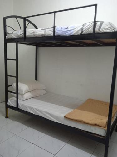Ein Bett oder Betten in einem Zimmer der Unterkunft Cool view hotel
