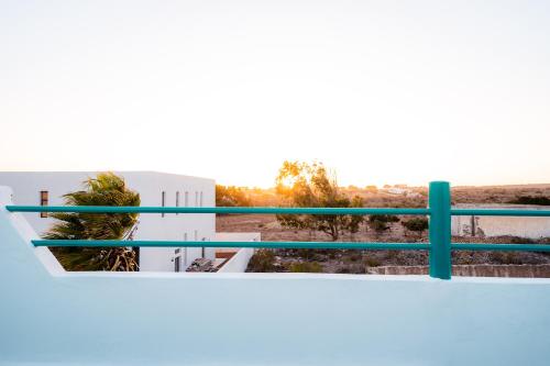 a view of the desert from the balcony of a building at Nour Mogador in Ghazoua