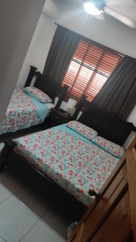 Cama o camas de una habitación en Hostal Compostela Inn