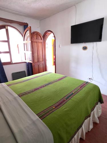 Ένα ή περισσότερα κρεβάτια σε δωμάτιο στο Casa Miranda