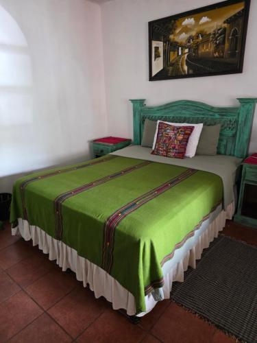 Ένα ή περισσότερα κρεβάτια σε δωμάτιο στο Casa Miranda